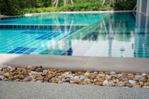 Heightened areas of your inground pool can serve as great tanning ledges, where you can catch rays while submerged!